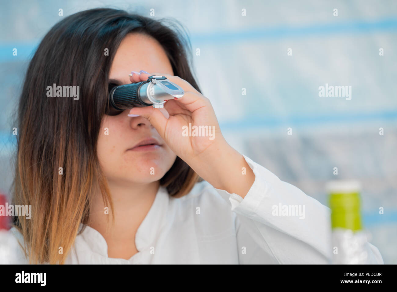 Food inspection, lab, measurement of sugar content with Refractometer