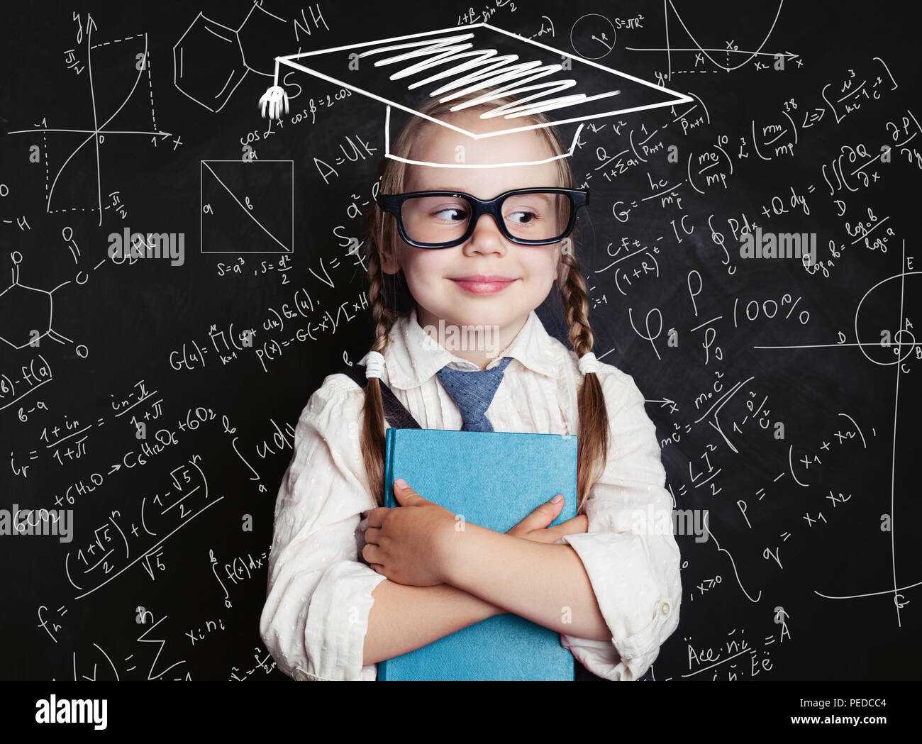 Successful female career concept. Cheerful little girl math student in