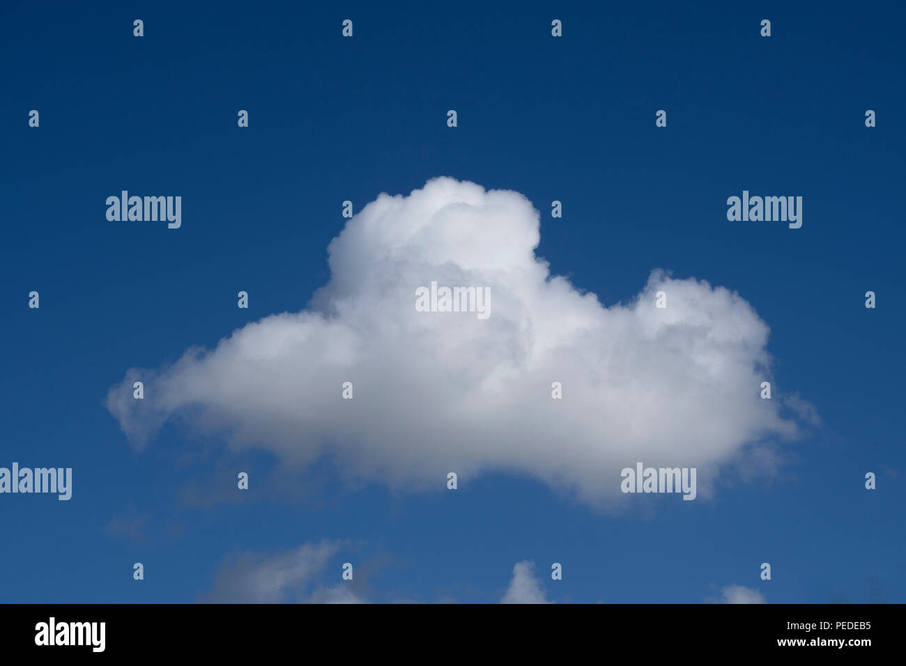 Single Cloud resembling a submaring Stock Photo