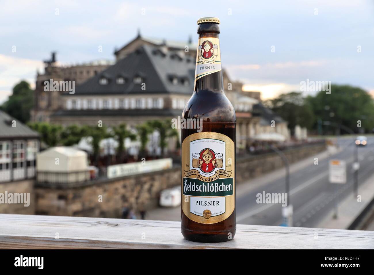 DRESDEN, GERMANY - MAY 10, 2018: Feldschlosschen pilsner beer bottle in Dresden. 1,300 breweries in Germany produce some 5,000 brands of beer. Stock Photo