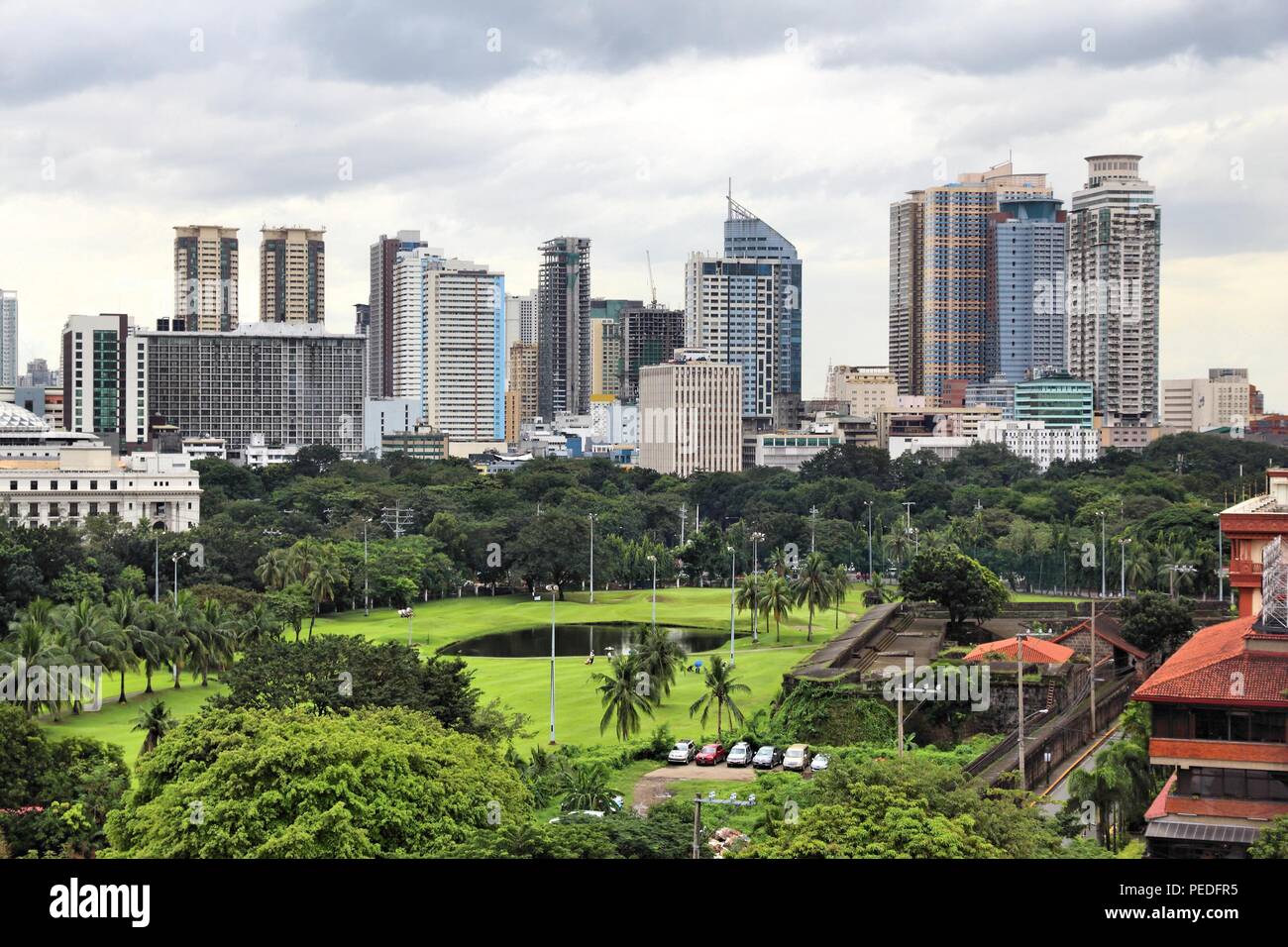 Manila city skyline in Philippines. Ermita and Paco districts seen from