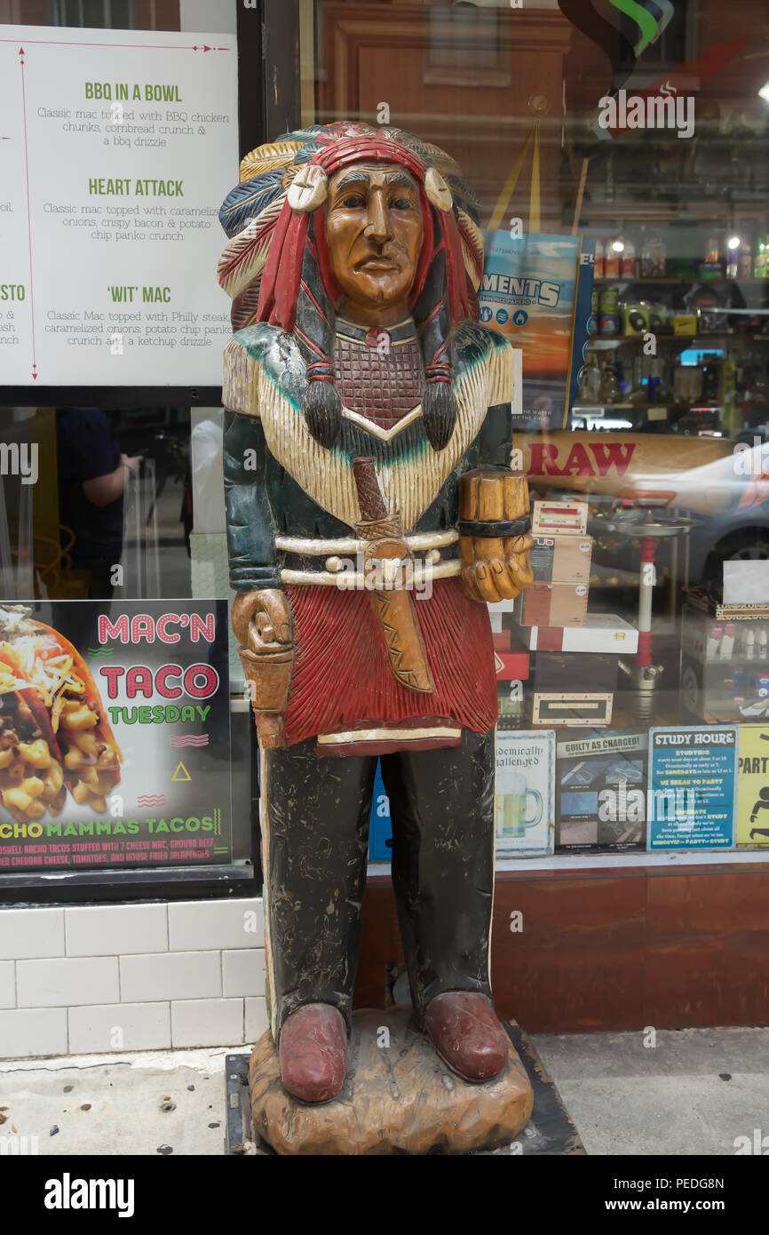 Red Indian statue in Walnut Street Philadelphia, USA Stock Photo Alamy
