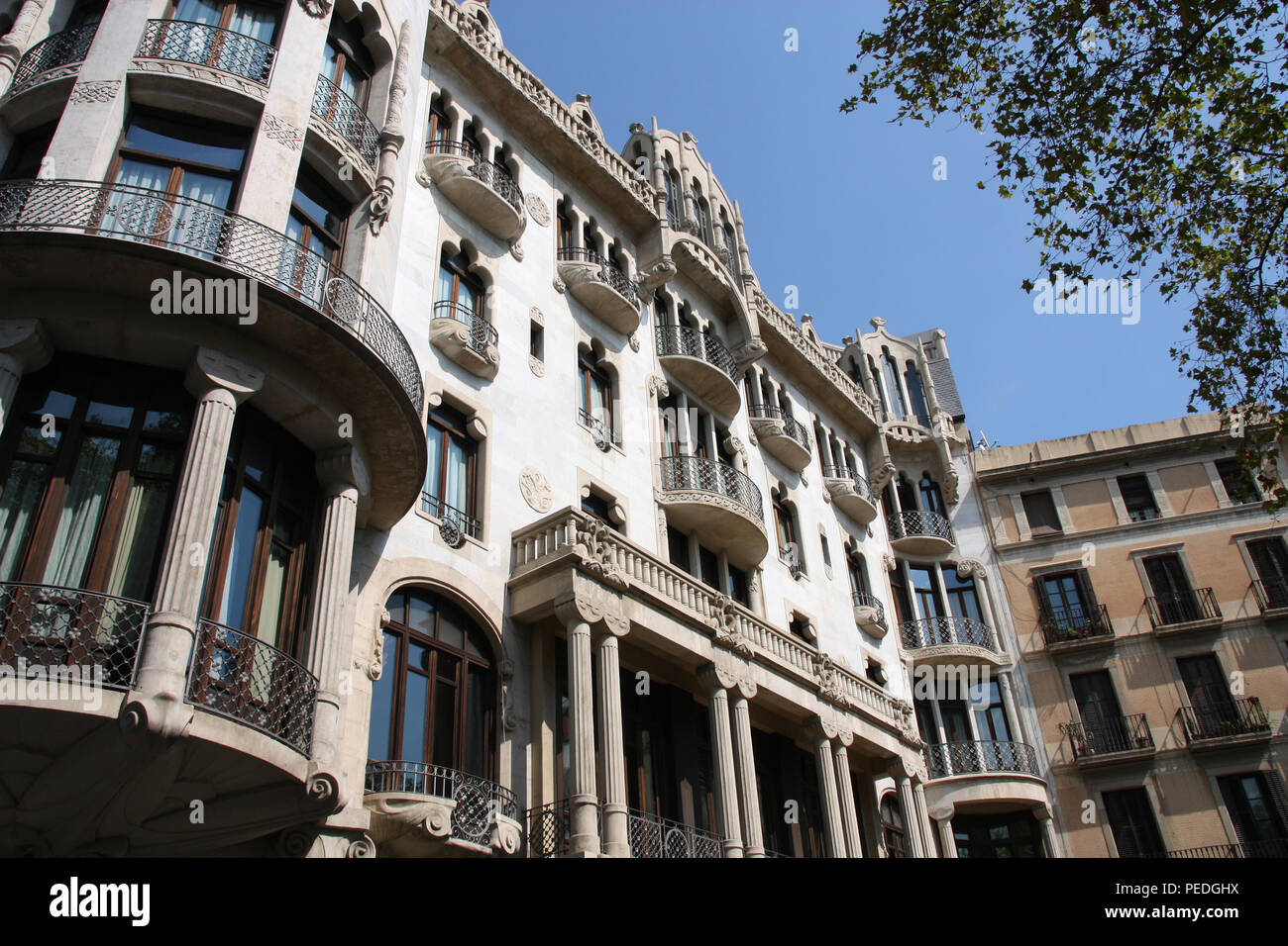Barcelona, Spain. Famous landmark in Eixample district - Casa Fuster by Lluis Domenech i Montaner. Modernisme (Catalan art nouveau) style. Stock Photo