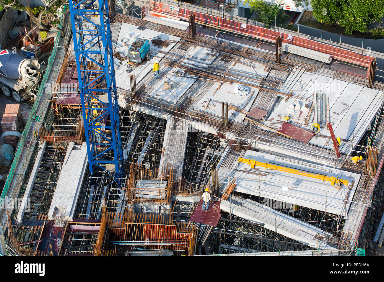 Aerial view of on-going construction industrial project which is building in progress. Stock Photo