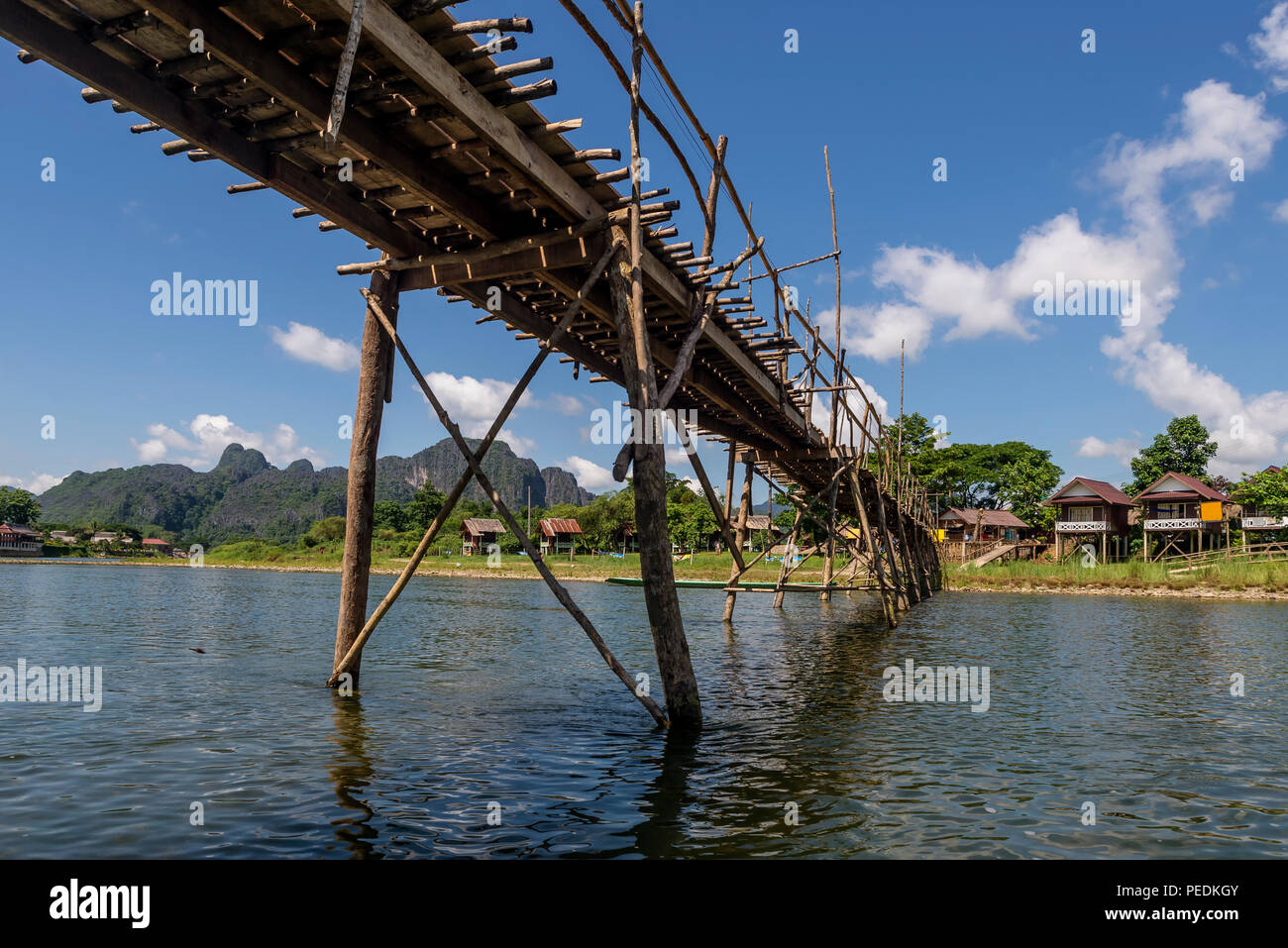 Bamboo bridge on the Nam Song river in Vang Vieng, Laos Stock Photo