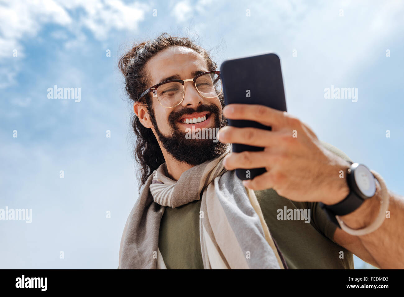 Man Using Device Downtown device hi-res stock photography and images - Alamy