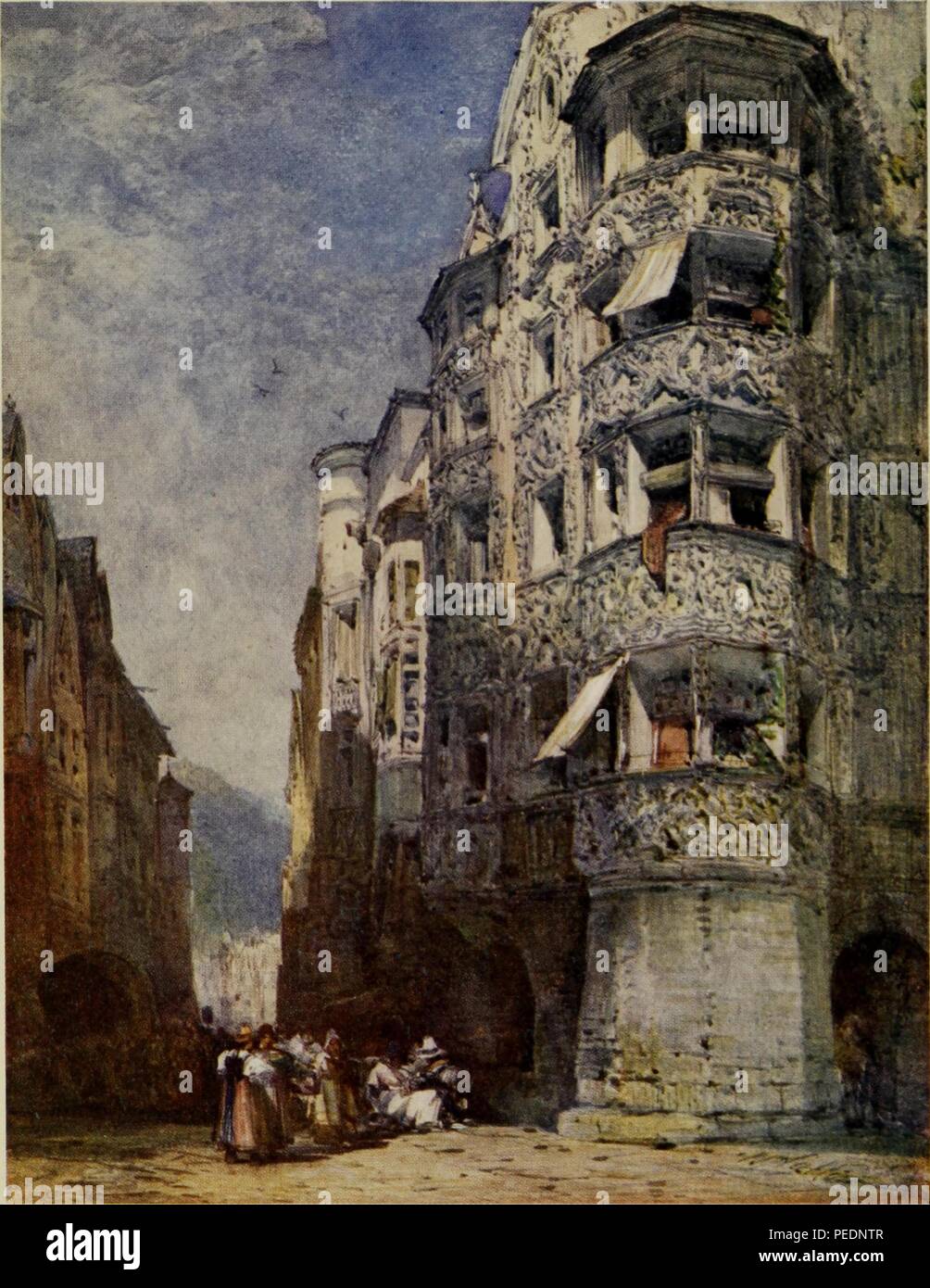 Color print depicting a city street in Innsbruck, Austria, with a heavily carved baroque, stone facade on the turreted building in the foreground, and several people gathered in the street, 1908. Courtesy Internet Archive. () Stock Photo