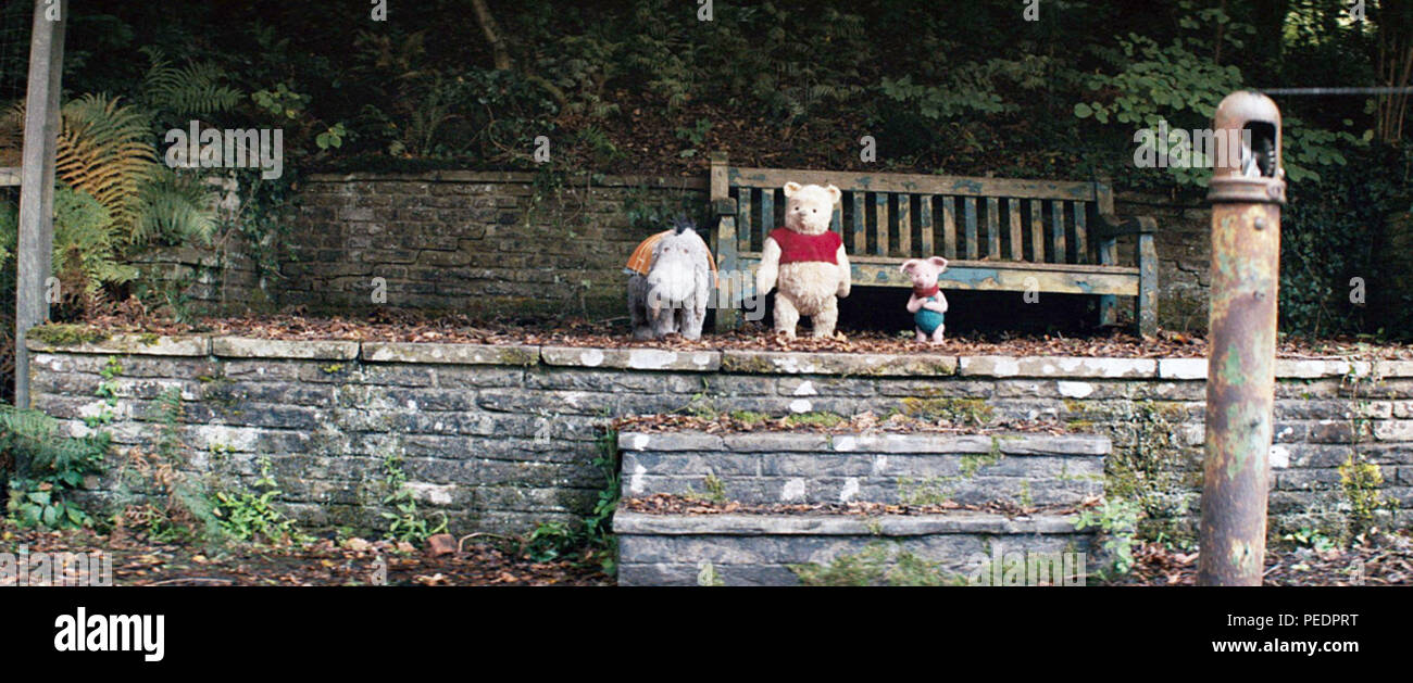 CHRISTOPHER ROBIN, lr Eeyore (voice Brad Garrett), Winnie the Pooh