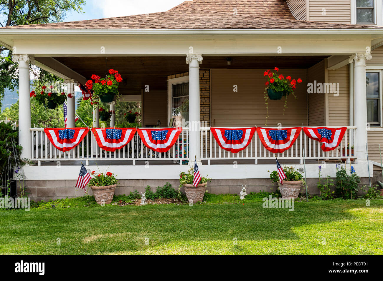 Porch fence decorated for Fourth of July;  Salida; Colorado; USA Stock Photo
