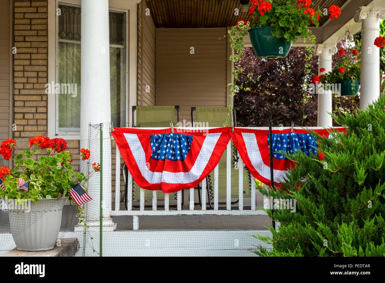 Porch fence decorated for Fourth of July;  Salida; Colorado; USA Stock Photo