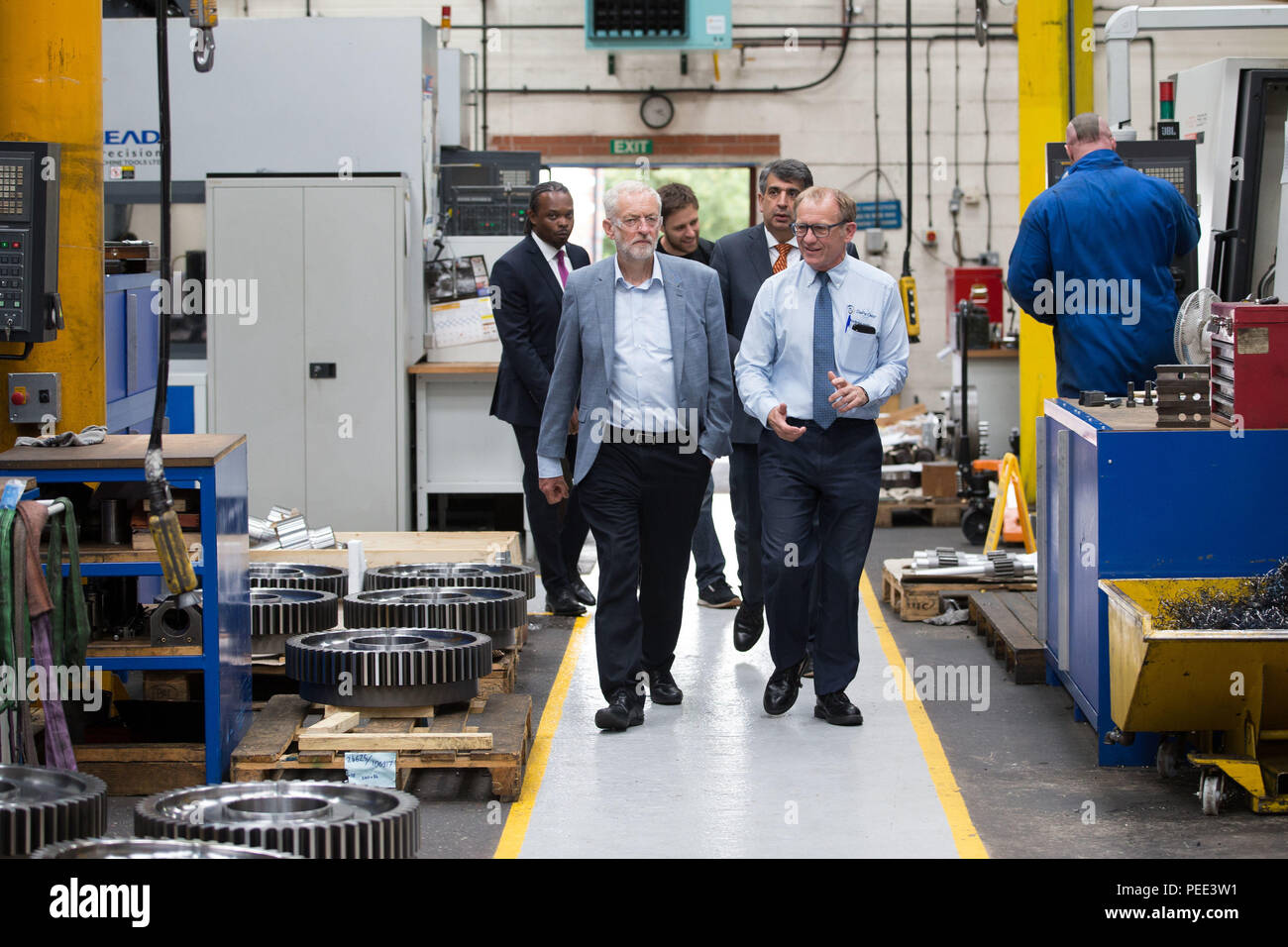 Labour leader Jeremy Corbyn and Andrew Jubb DePe Gear managing director of during his visit to DePe Gear CO LTD, Stoke-on-Trent. Corbyn came under attack from Israeli Prime Minister Benjamin Netanyahu on Monday after it emerged that he attended a ceremony where a wreath was was laid in memory of Palestinians suspected of being behind the Munich Olympics massacre. Stock Photo
