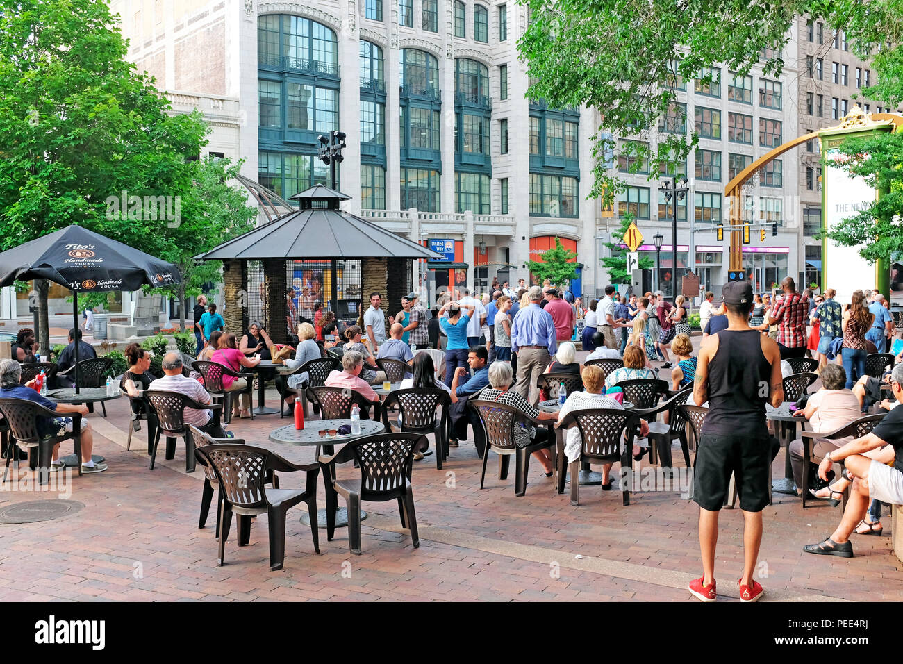 Summertime 'Dancing Under the Stars' Tuesday night program attracts people to the theater district for outdoor dancing to a live band in Cleveland USA Stock Photo