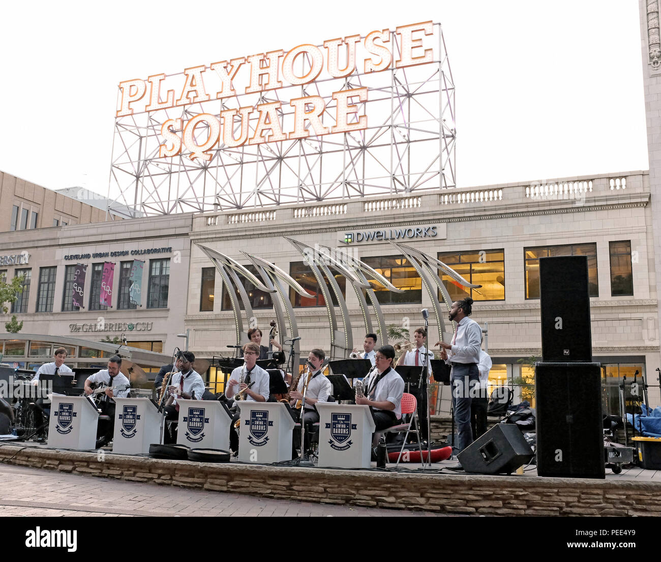 The L.A. Swing Barons play live outdoors in Cleveland's Playhouse Square during one of the cities weekly outdoor concert and dance gatherings. Stock Photo