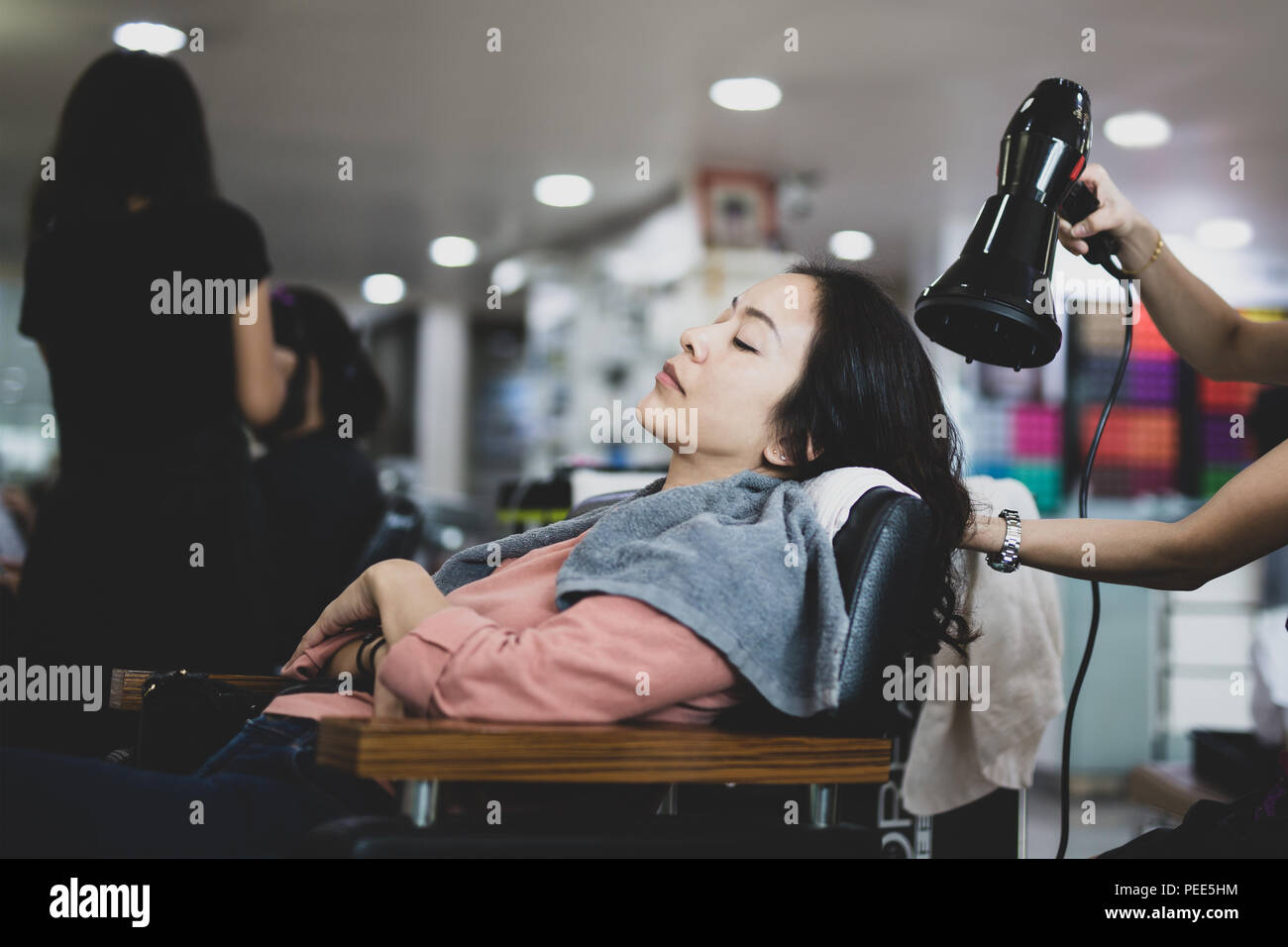 Blow dry hair hi-res stock photography and images - Alamy