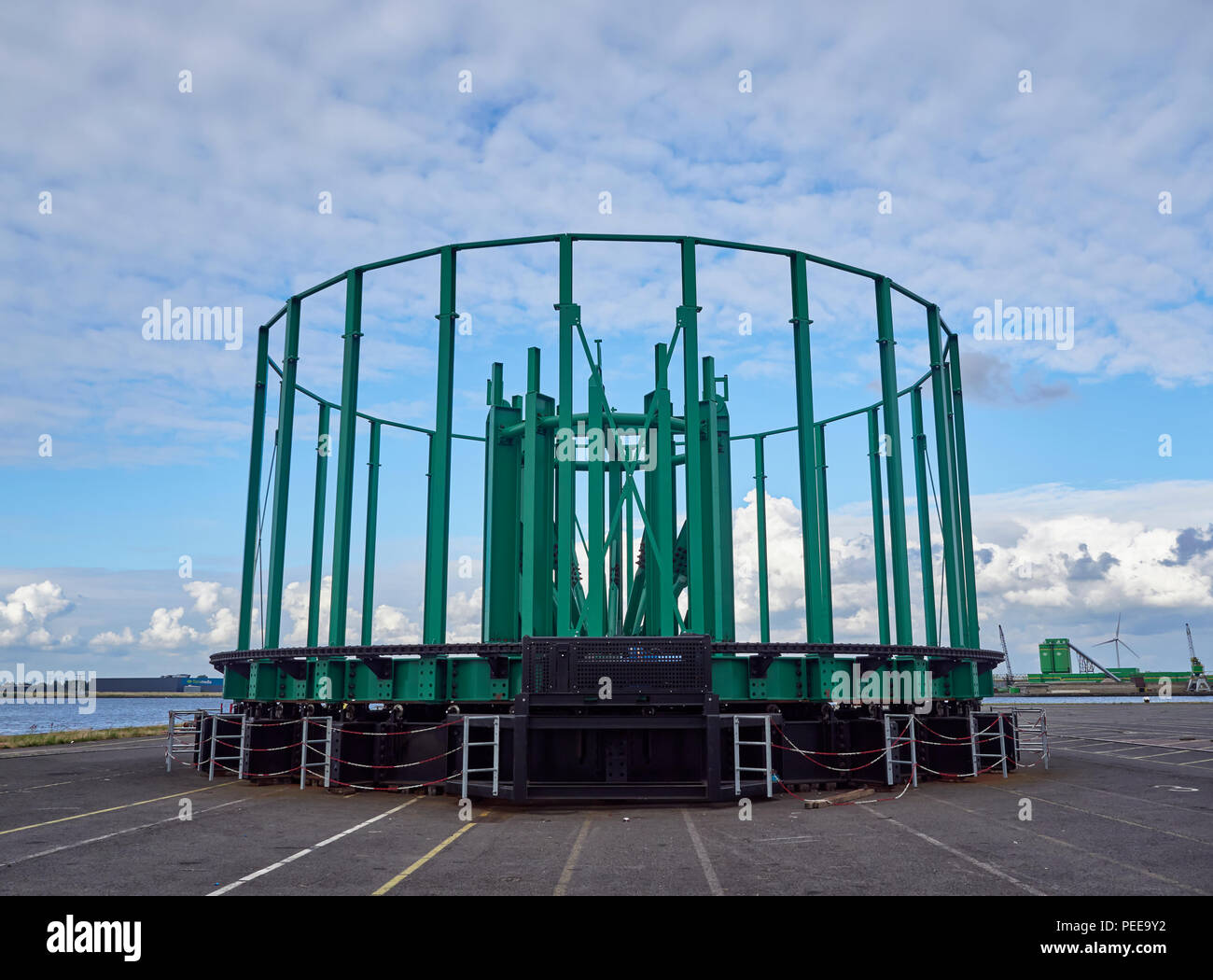 An Empty Rotating Cable drum lies on its side after unloading its Cargo at Alaskahaven Container Terminal in Amsterdam, The Netherlands. Stock Photo