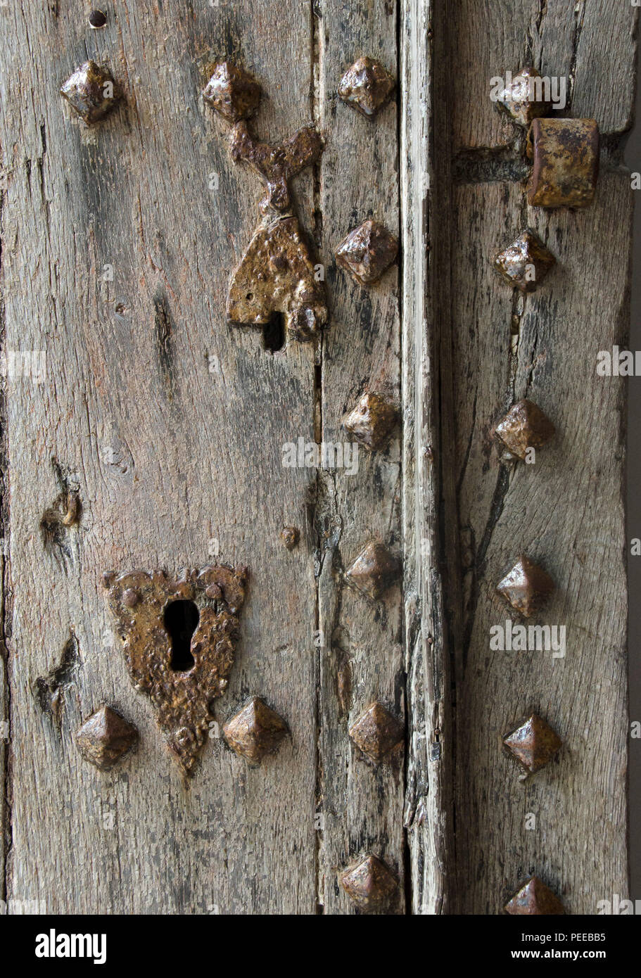 old rusty iron lock on a wooden door Stock Photo - Alamy