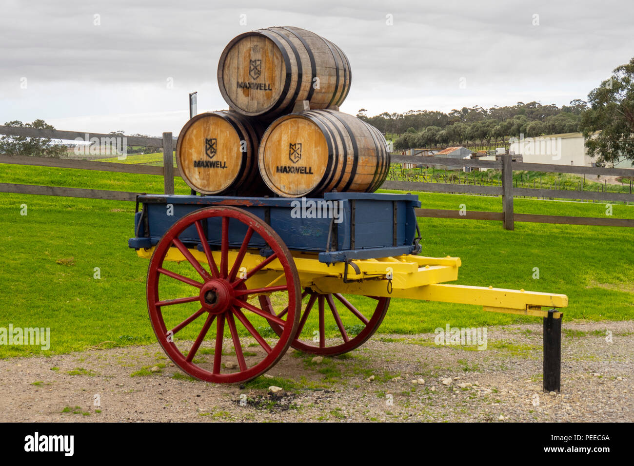 Three wooden barrels on a wooden cart at the entrance to Maxwell Winery McLaren Vale SA Australia. Stock Photo