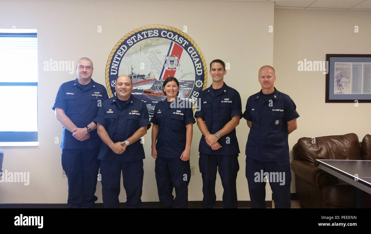 Petty Officer 2nd Class Paul Jacob, (second from the right) boatswain's