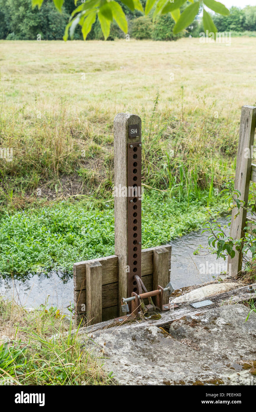 Simple locking mechanism for a sluice gate Stock Photo
