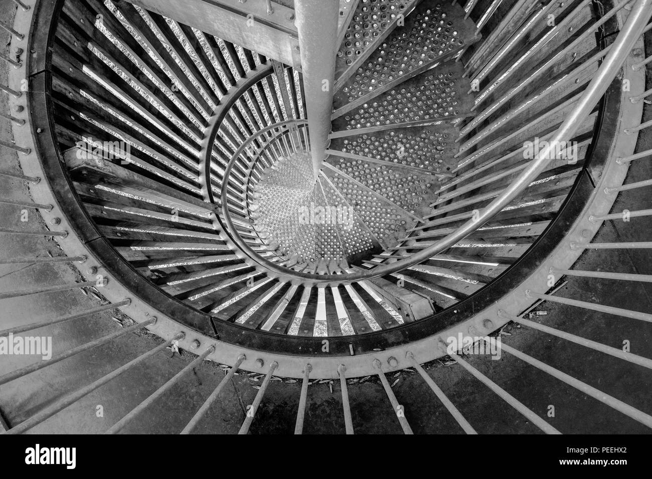 Steel spiral staircase as fire escape. Stock Photo