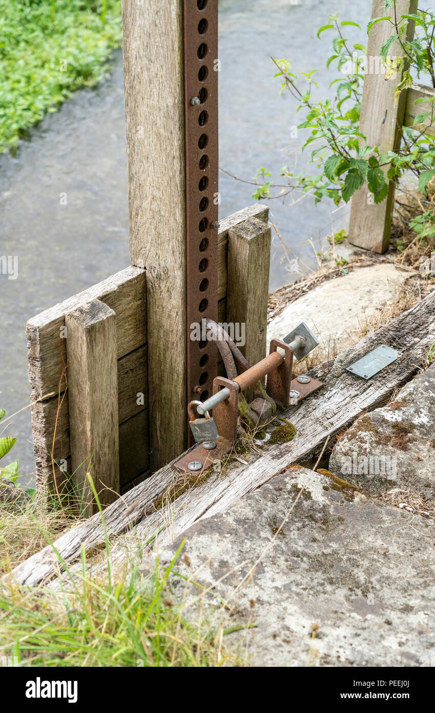 Simple locking mechanism for a sluice gate Stock Photo