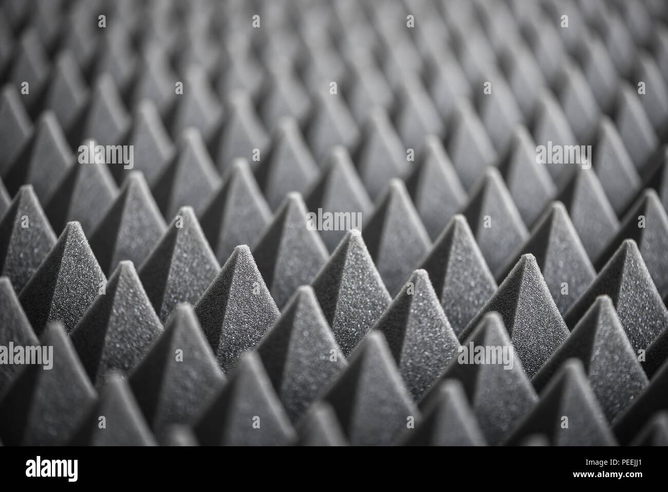 Close up of Sound Absorbing Sponge in Recording Studio. Dampening Acoustical Foam in Music Studio. Acoustic Foam Detail. Stock Photo