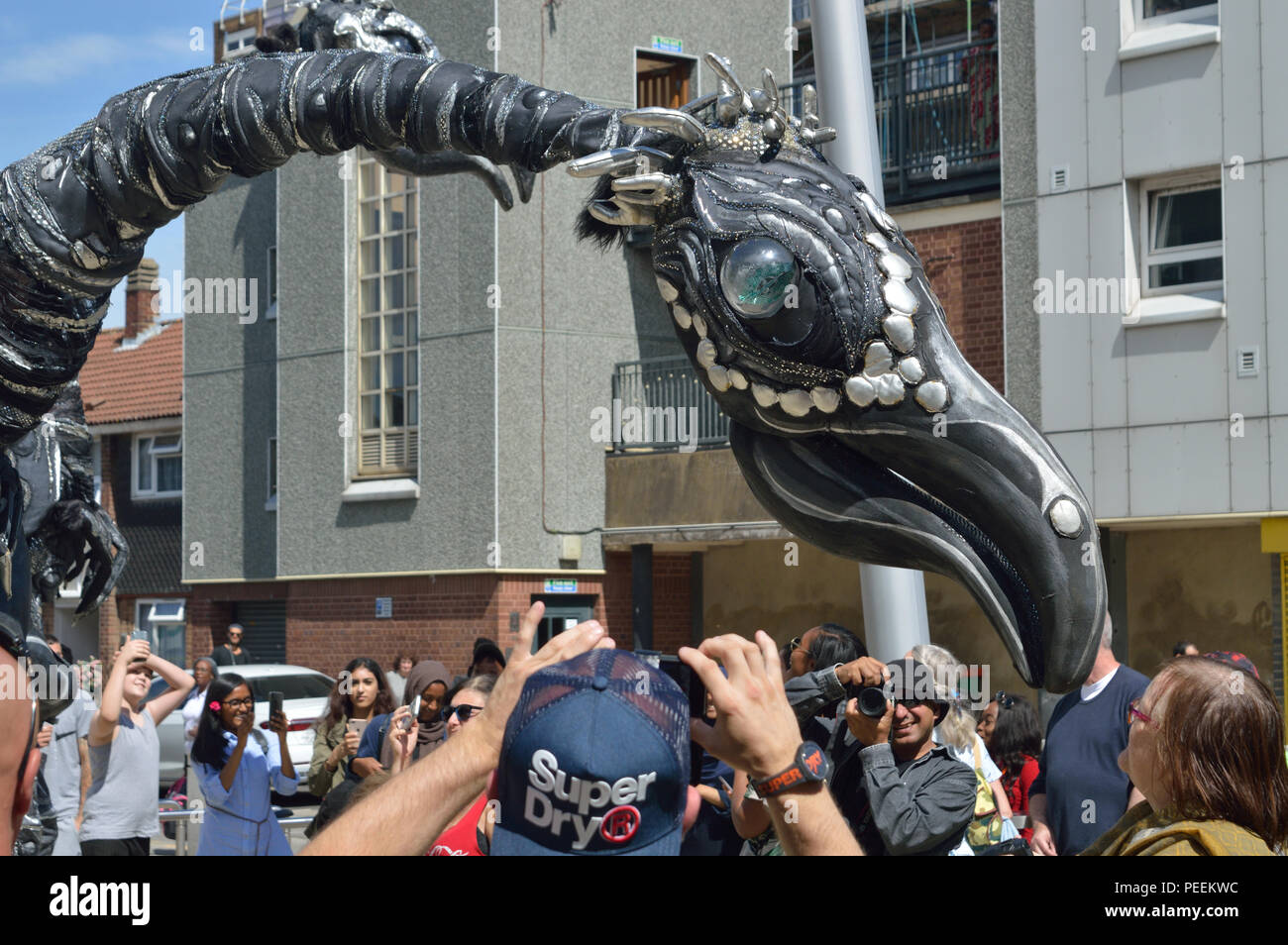 Dutch street theatre group Close Act Theatre performing their SAURUS show at the 2018 Ferry Festival in North Woolwich, Newham, London Stock Photo