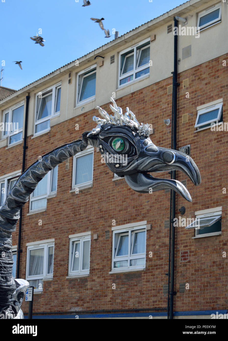 Dutch street theatre group Close Act Theatre performing their SAURUS show at the 2018 Ferry Festival in North Woolwich, Newham, London Stock Photo