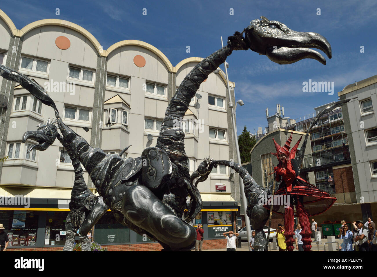 Dutch street theatre group Close Act Theatre performing their SAURUS show at the 2018 Ferry Festival in North Woolwich, Newham, London Stock Photo