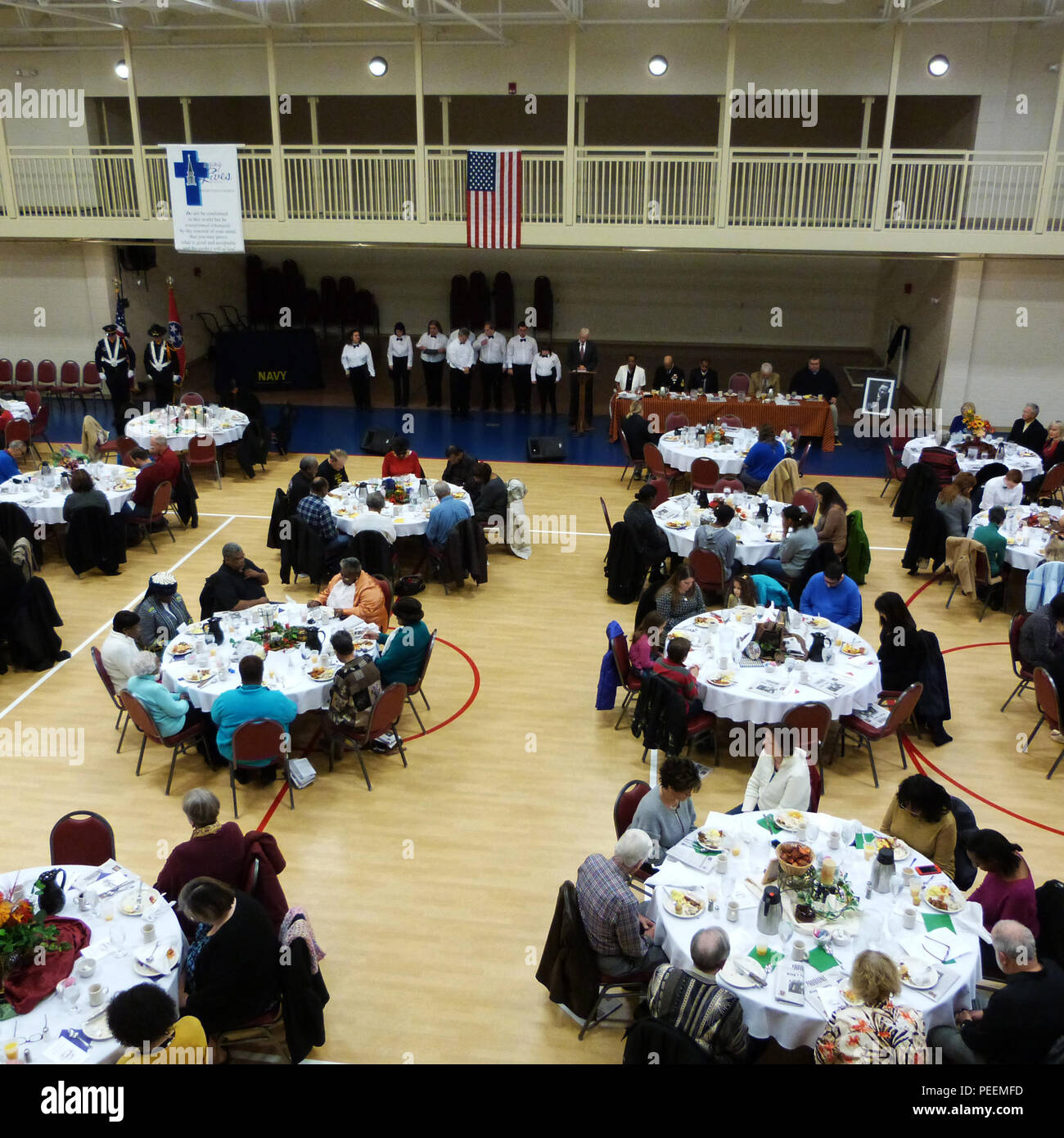 Morning invocation is being said during the 7th annual community hi-res ...