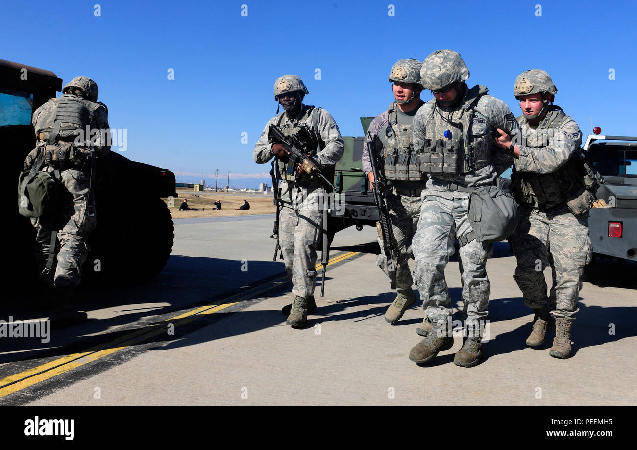 Airmen from the 39th Security Forces Squadron apprehend a simulated ...