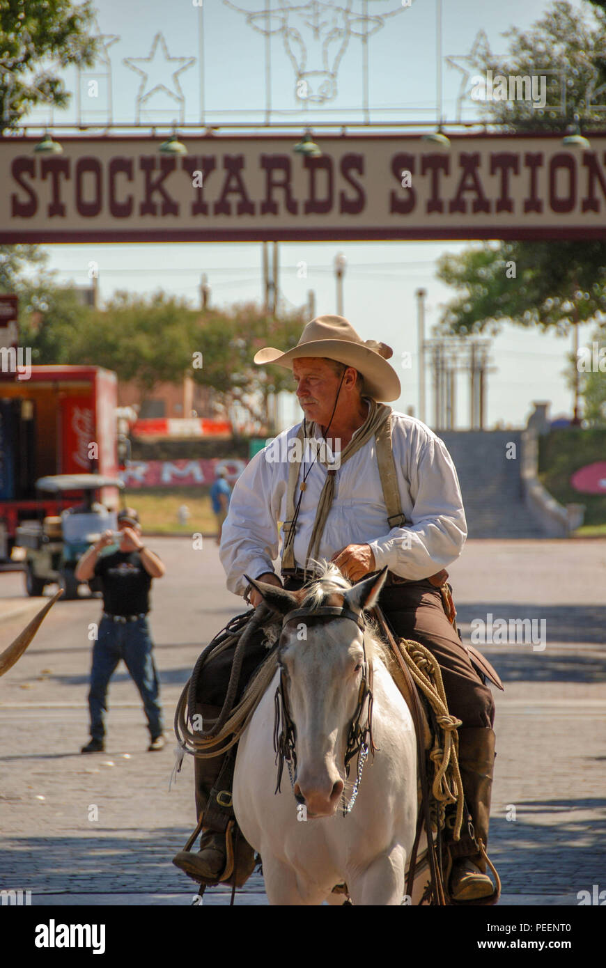 Cowboy in horseback riding down the Main Street at the Fort Worth Stockyards Stock Photo Alamy