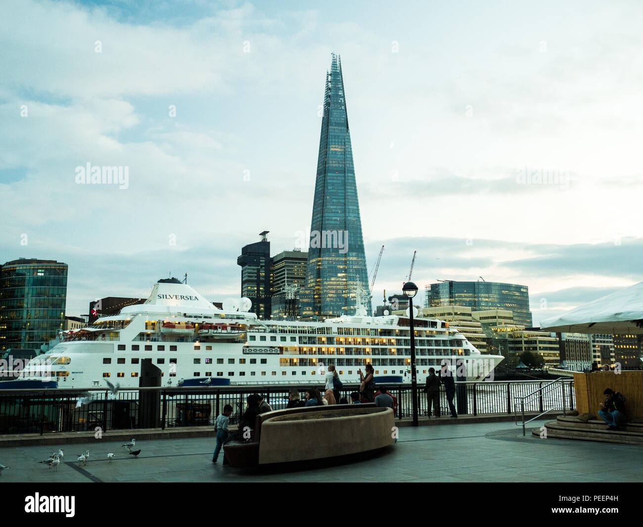 Cruise Ship on the River Thames with The Shard (of Glass) skyscraper, London. Stock Photo
