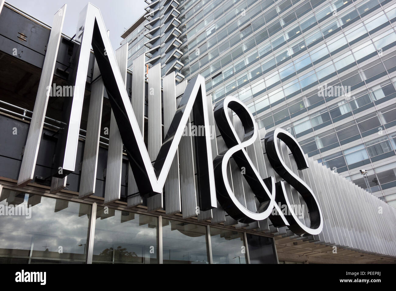 Marks & Spencer signage outside M&S Tolworth Simply Food, The Broadway, Tolworth Towers, Surbiton, KT5, UK Stock Photo