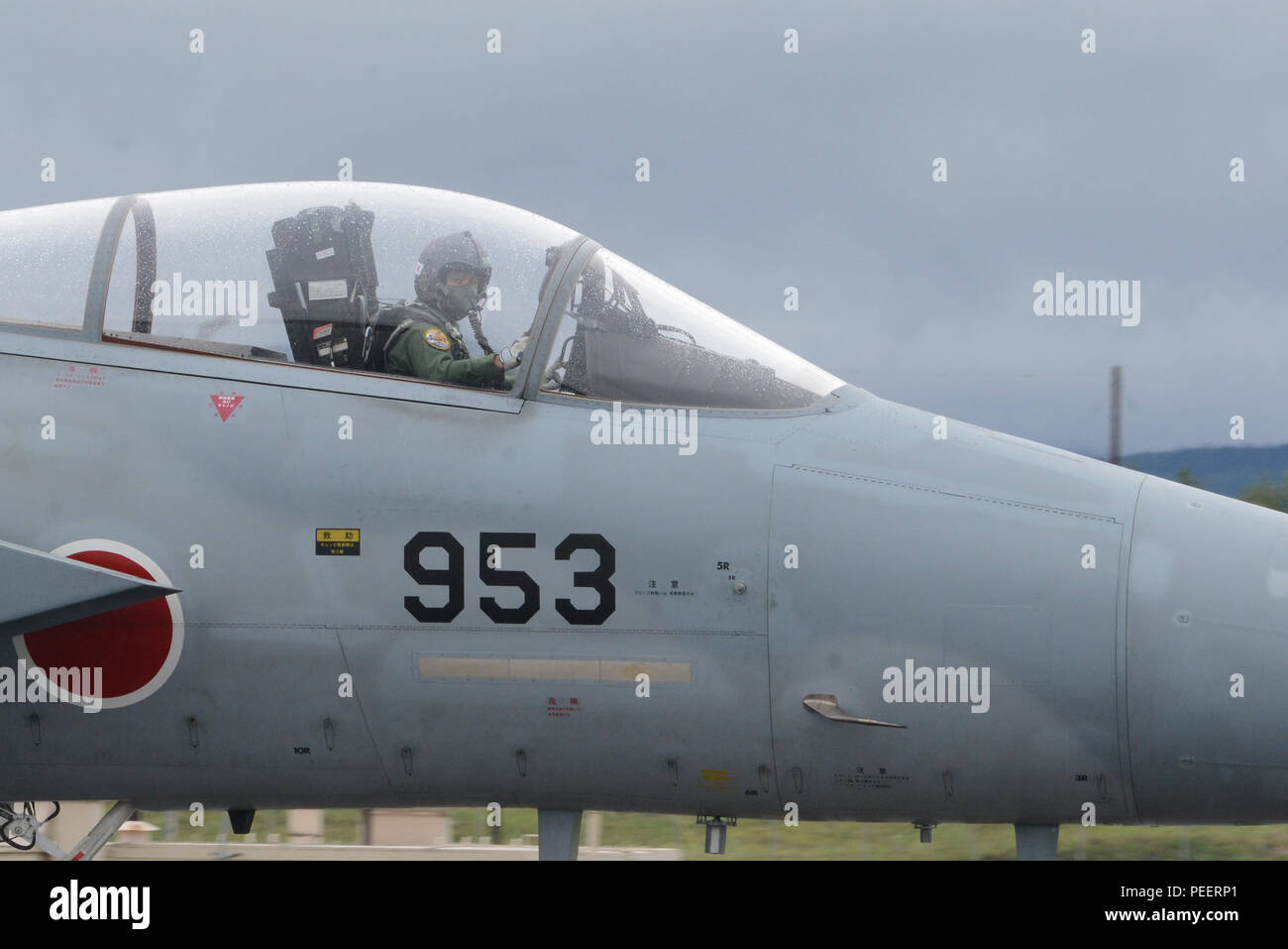 A Japanese Air Self-Defense Force F-15J Eagle pilot taxis at Eielson Air Force Base, Alaska, Aug. 10, 2015, during Red Flag-Alaska (RF-A) 15-3. RF-A is a series of Pacific Air Forces commander-directed field training exercises for U.S. and partner nation forces, providing combined offensive counter-air, interdiction, close air support and large force employment training in a simulated combat environment. (U.S. Air Force photo by Senior Airman Ashley Nicole Taylor/Released) Stock Photo