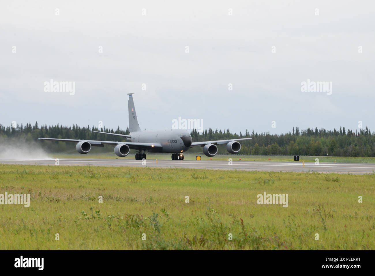 A U.S. Air Force KC-135R stratotanker assigned to the 22nd Air Refueling Wing, McConnell Air Force Base, Kan., takes off from Eielson Air Force Base, Alaska, Aug. 10, 2015, during Red  Flag-Alaska (RF-A) 15-3. RF-A is a series of Pacific Air Forces commander-directed field training exercises for U.S. and partner nation forces, providing combined offensive counter-air, interdiction, close air support and large force employment training in a simulated combat environment. (U.S. Air Force photo by Senior Airman Ashley Nicole Taylor/Released) Stock Photo