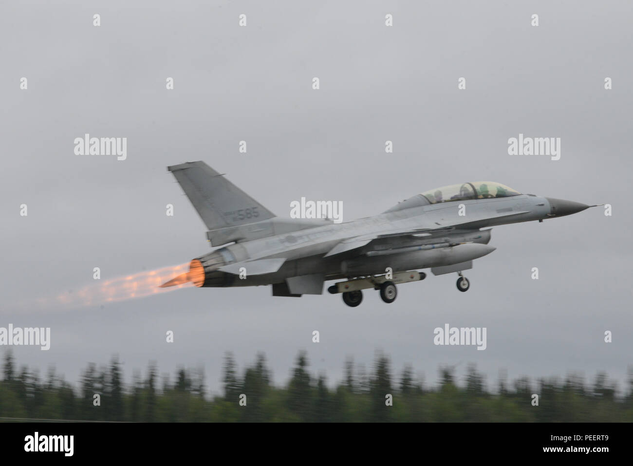A Republic of Korea air force F-16 Fighting Falcon takes off from Eielson Air Force Base, Alaska, Aug. 10, 2015, during Red Flag-Alaska (RF-A) 15-3. RF-A is a series of Pacific Air Forces commander-directed field training exercises for U.S. and partner nation forces, providing combined offensive counter-air, interdiction, close air support and large force employment training in a simulated combat environment. (U.S. Air Force photo by Senior Airman Ashley Nicole Taylor/Released) Stock Photo