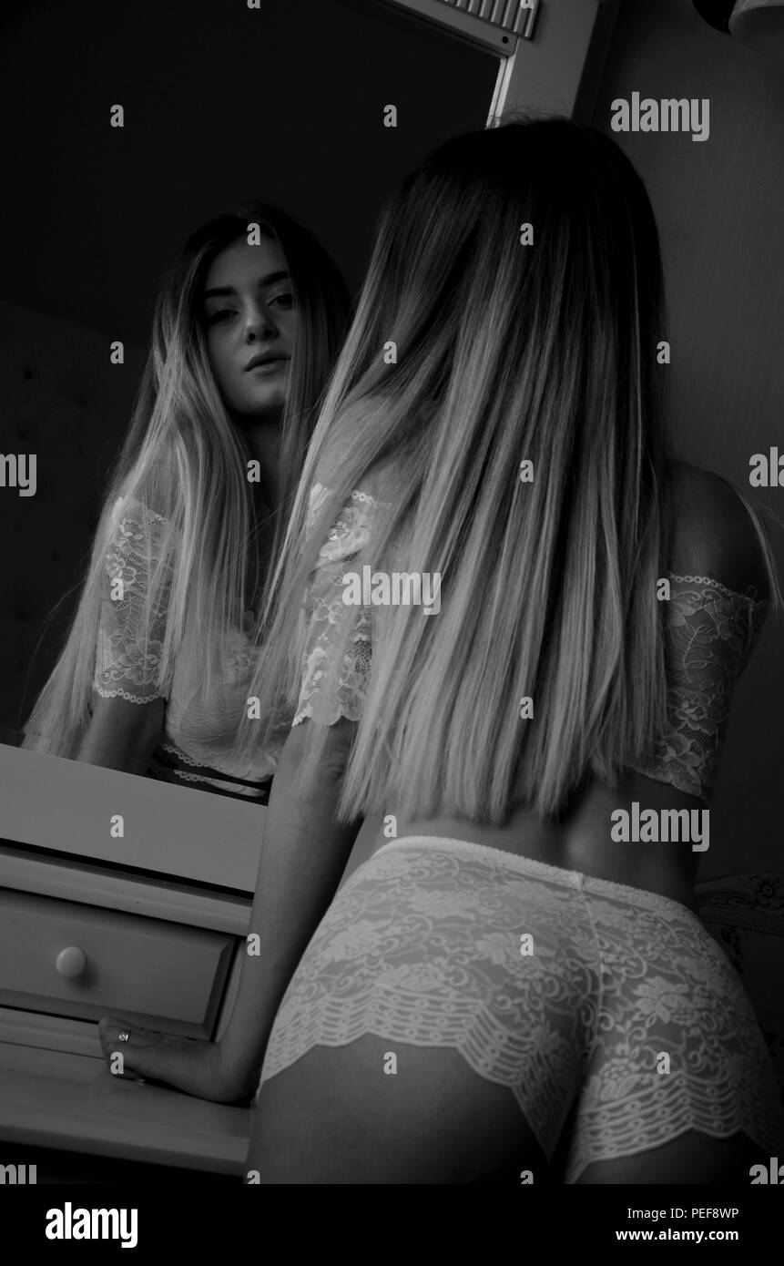 Girl in mirror Stock Photo Alamy