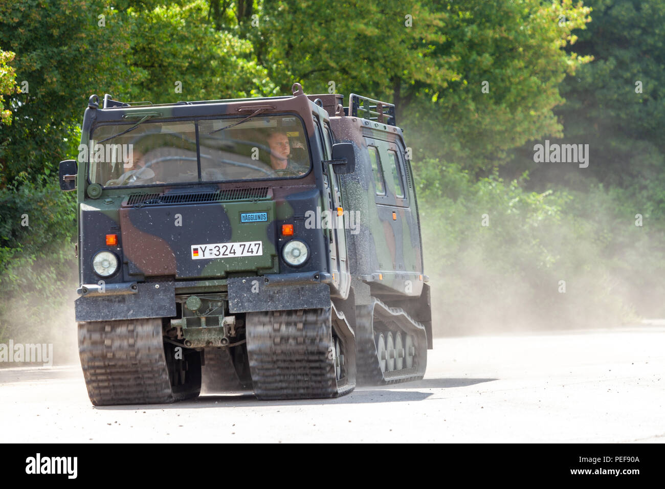 FELDKIRCHEN / GERMANY - JUNE 9, 2018: German armoured personnel carrier Bandvagn 206, from Bundeswehr, drives on a road at Day of the Bundeswehr. Stock Photo