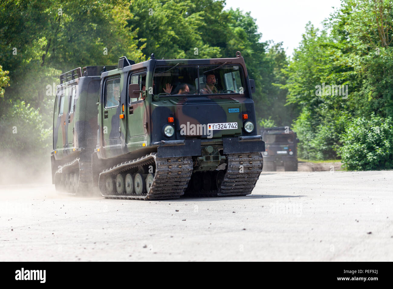 FELDKIRCHEN / GERMANY - JUNE 9, 2018: German armoured personnel carrier Bandvagn 206, from Bundeswehr, drives on a road at Day of the Bundeswehr. Stock Photo
