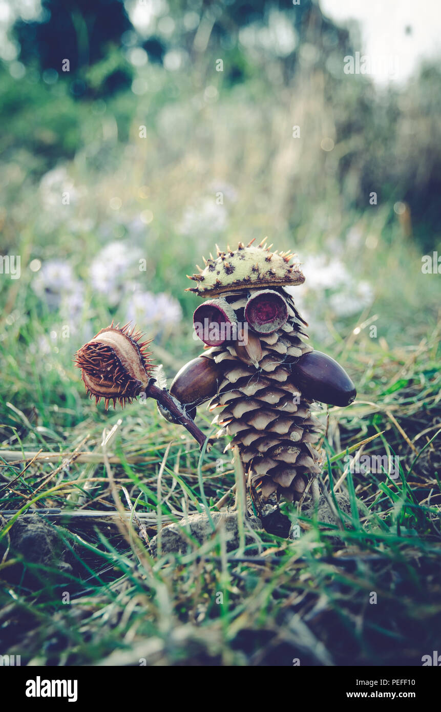 cute funny fantasy figure  made from pine cone Stock Photo