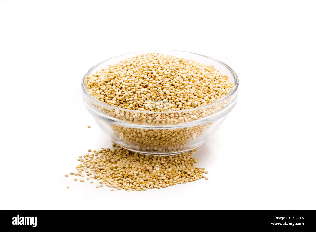 Container with quinoa isolated on a white background Stock Photo