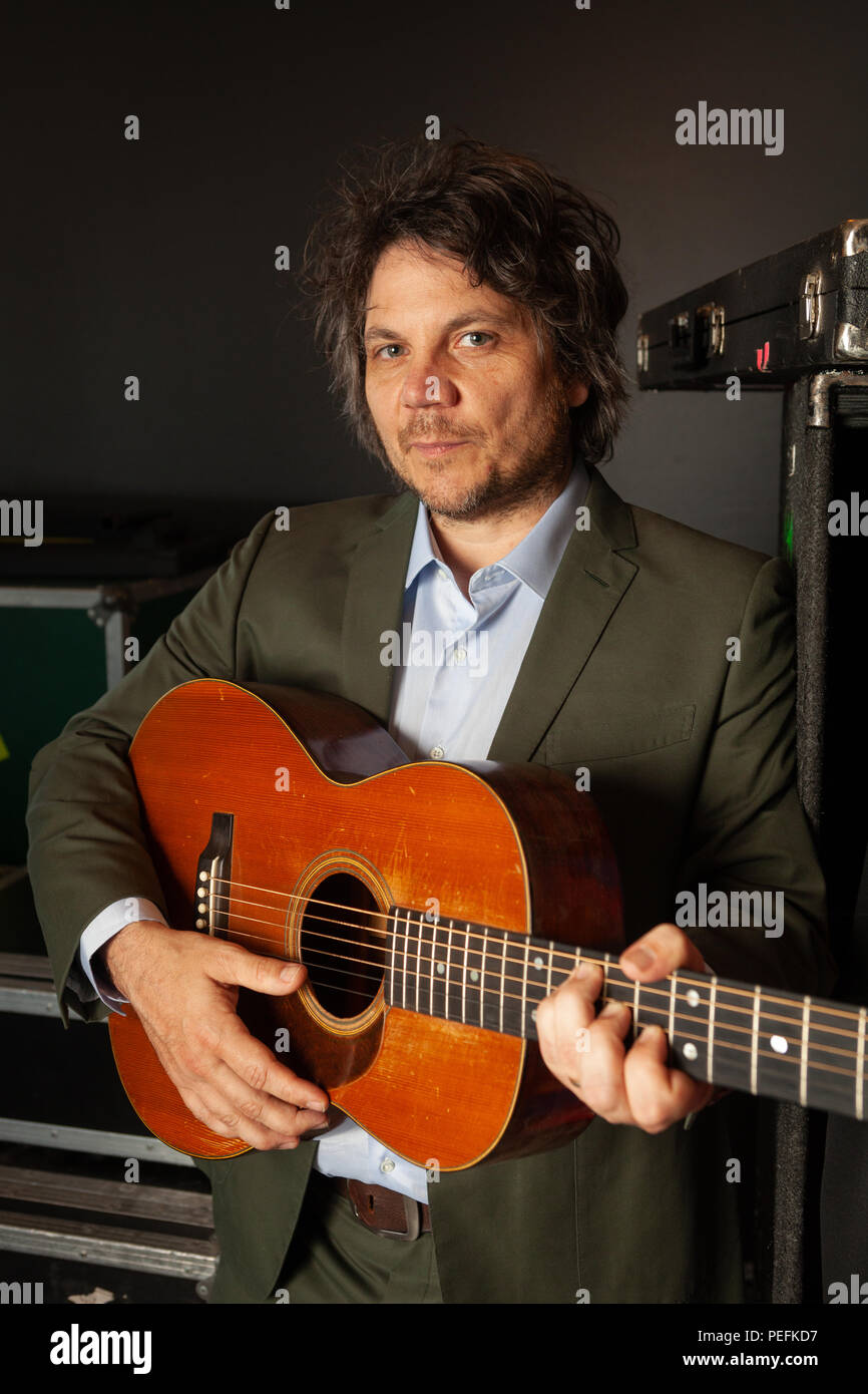 Jeff Tweedy with guitar, at his rehearsal space in Chicago, Illinois. Stock Photo