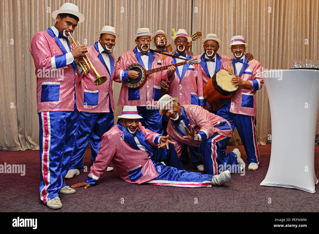 Kaapse Klopse minstrels garbed in bright colours,and playing an array