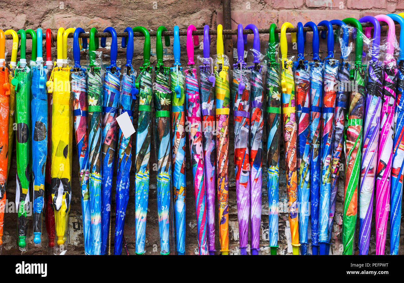 Colorful longsize Umbrellas kept for sale in the street of Kathmandu Nepal. Street Sellers Stock