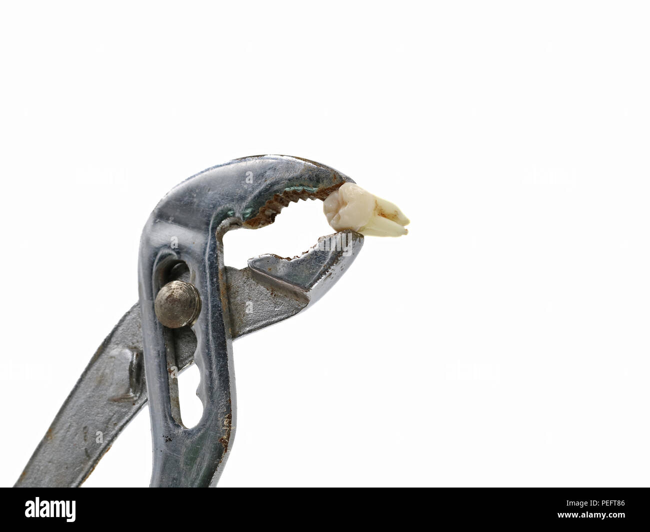 Dentist pulling tooth hires stock photography and images Alamy