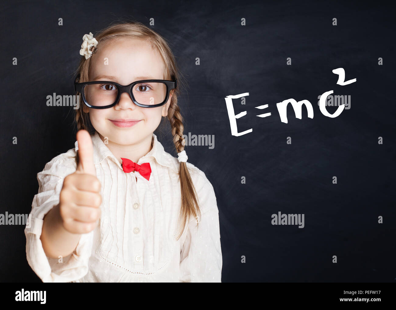 Little genius portrait. Kids mathematics education concept. Little girl