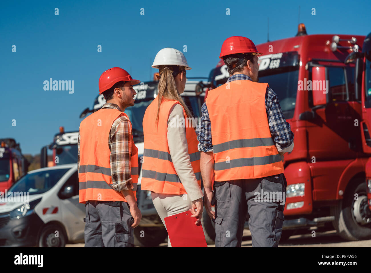 Driver and booker of heavy transport cargo company  Stock Photo