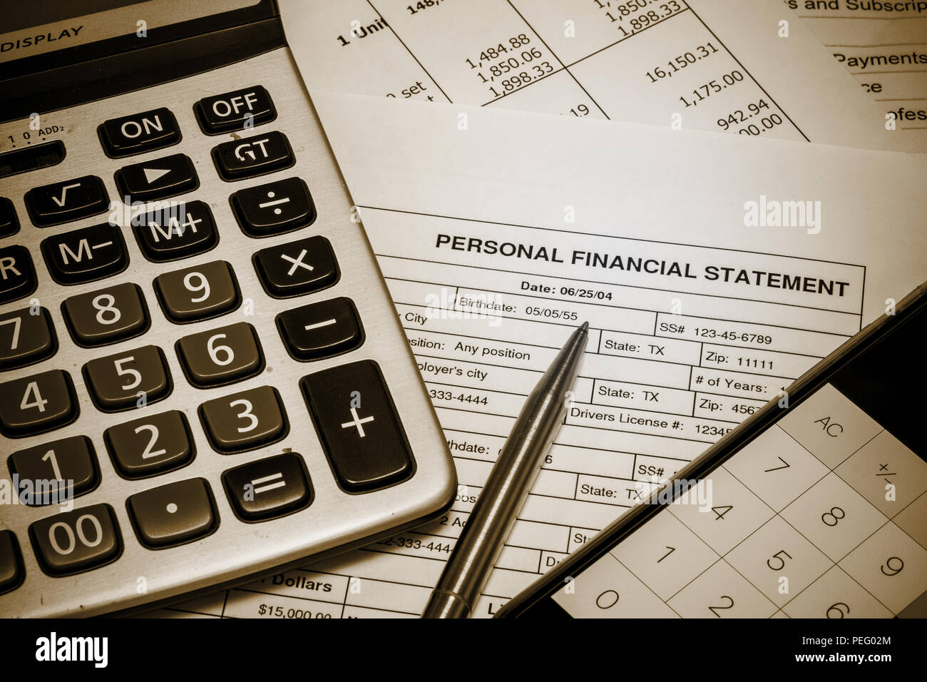 Personal financial statement document, calculator, pen and smartphone.  Vintage effect Stock Photo - Alamy