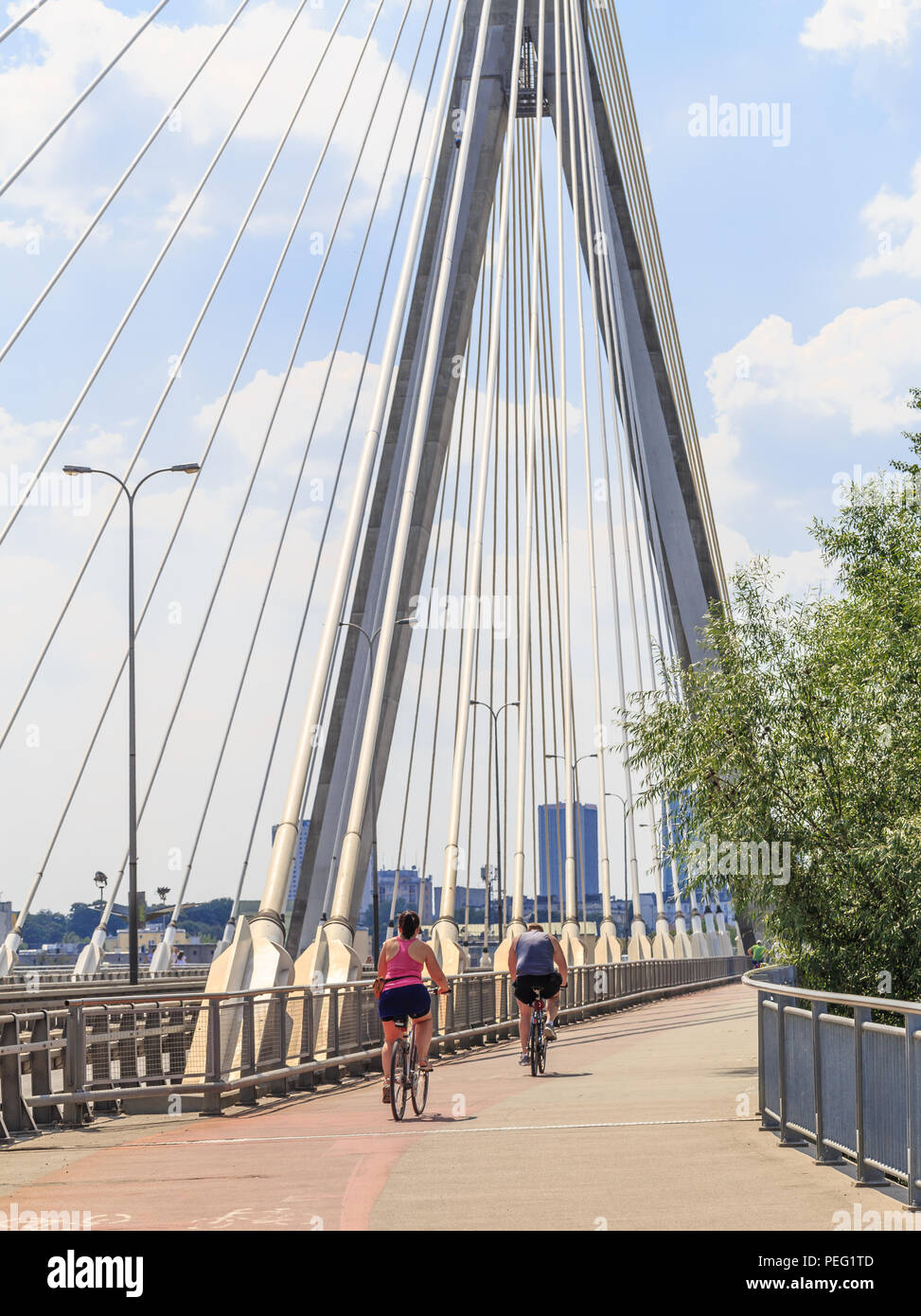 Bicycle path on Swietokrzyski bridge in Warsaw is very popular among cyclists Stock Photo
